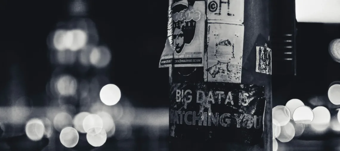 a pole with a bunch of stickers on it