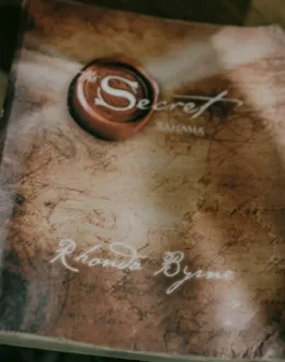 a book sitting on top of a wooden table